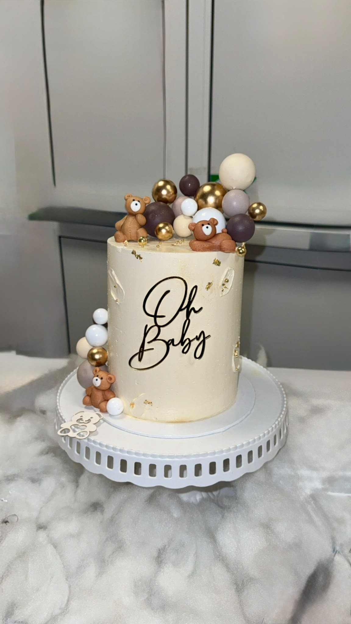 Oh Baby teddy bear baby shower cake with gold accents