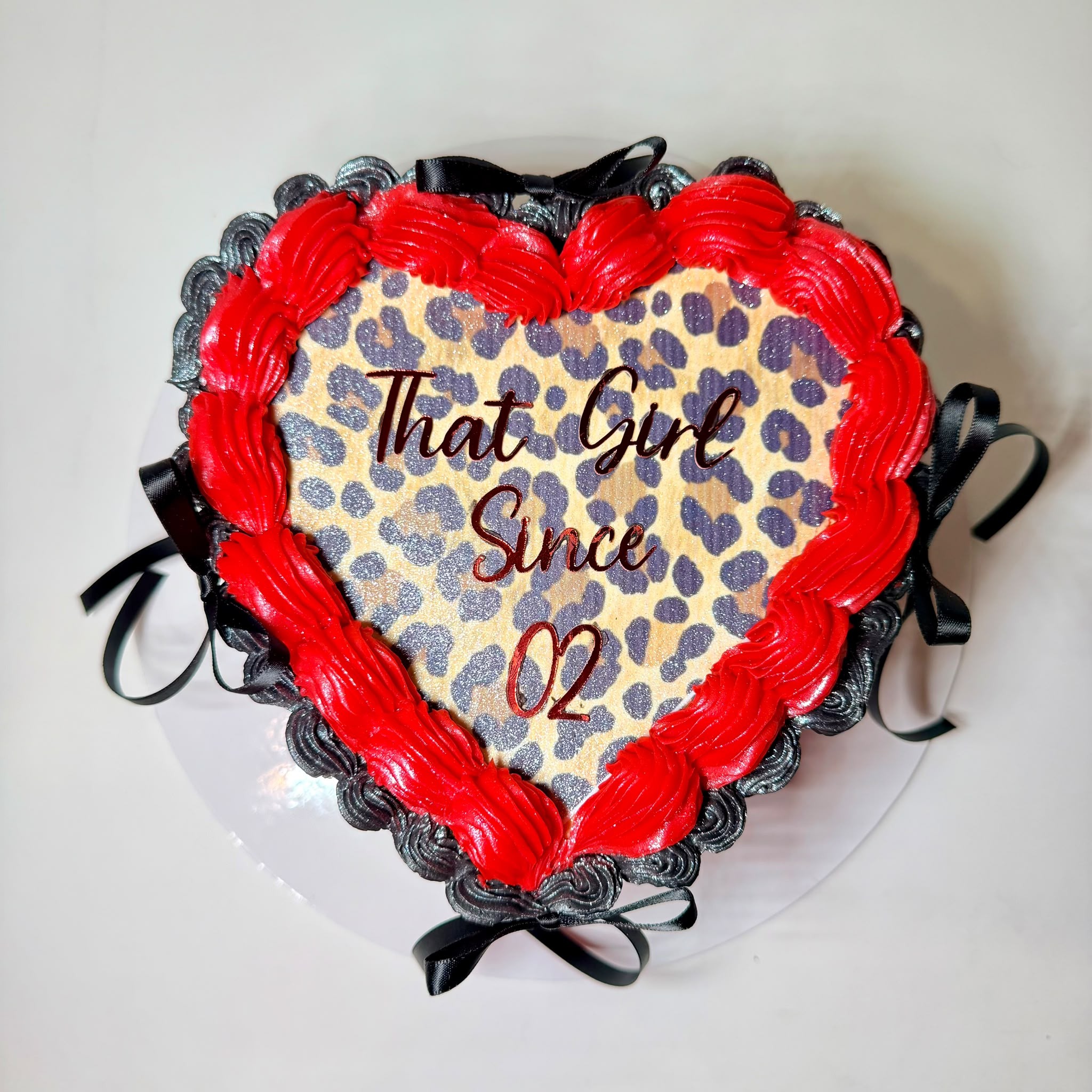 Heart shaped leopard print celebration cake